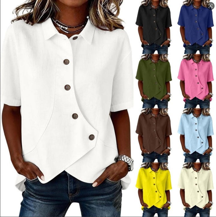 Blusa femminile elegante a tinta unita, con design moderno e bottoni asimmetrici.