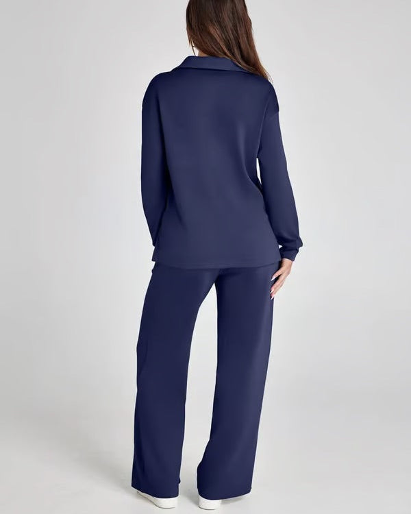 Set casual chic donna: felpa V-neck e pantaloni palazzo, outfit rilassato ed elegante.