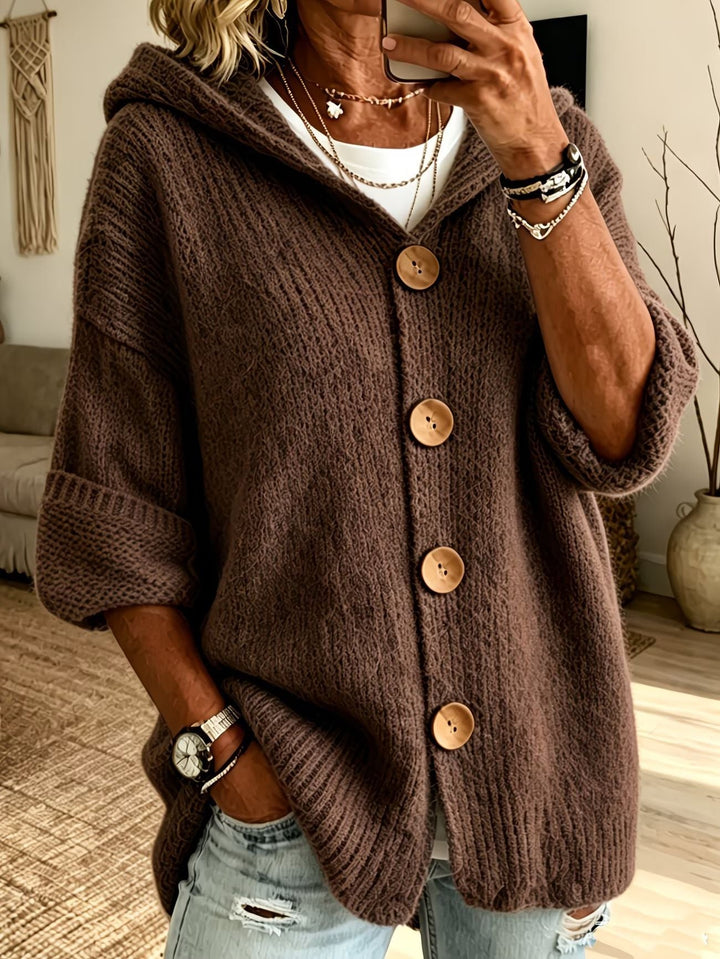 Cardigan da donna casual, vista frontale, con cappuccio e bottoni, perfetto per la moda di tutti i giorni.