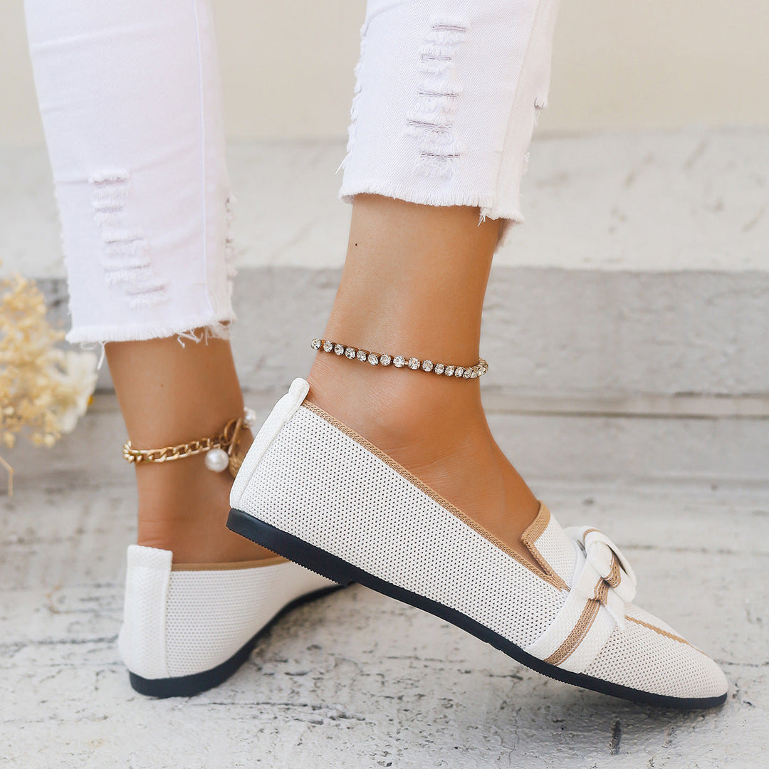 Eleganti ballerine mocassini slip-on da donna con fiocco decorativo, perfette per look casual e chic.