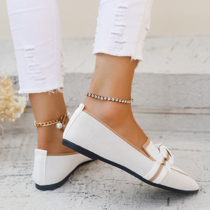 Eleganti ballerine mocassini slip-on da donna con fiocco decorativo, perfette per look casual e chic.