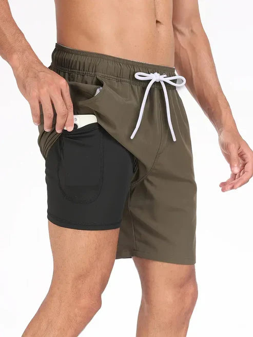 Shorts uomo per allenamento, grigi, con vestibilità comoda e traspirante. Ottimi per fitness e performance atletica.