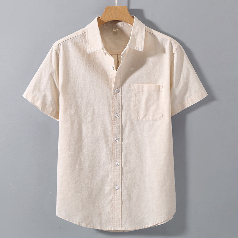 Camicia estiva uomo a maniche corte con colletto revers, vestibilità ampia. Stile casual e confortevole per l'estate.
