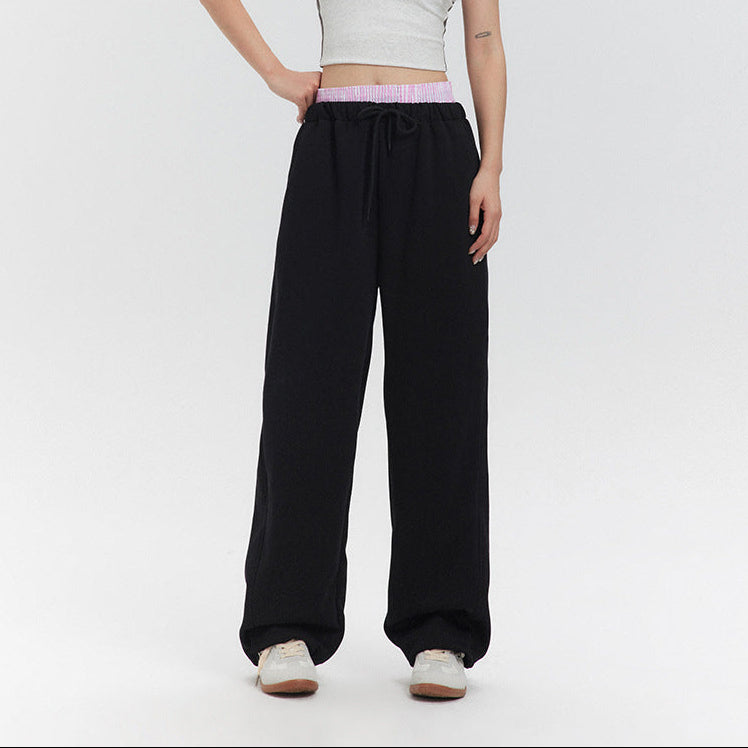 Pantalone tuta moderno donna in stile athleisure. Vita regolabile per massimo comfort e look sportivo.