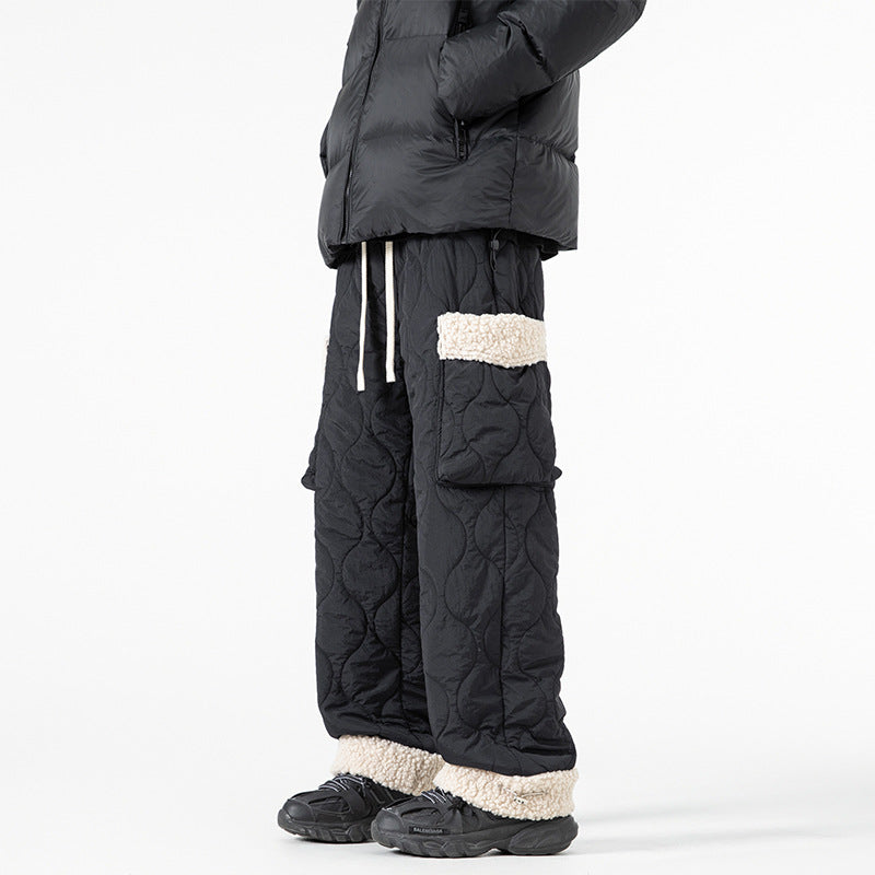Pantaloni sci uomo impermeabili e robusti per l'outdoor, con protezione da neve e temperature invernali.