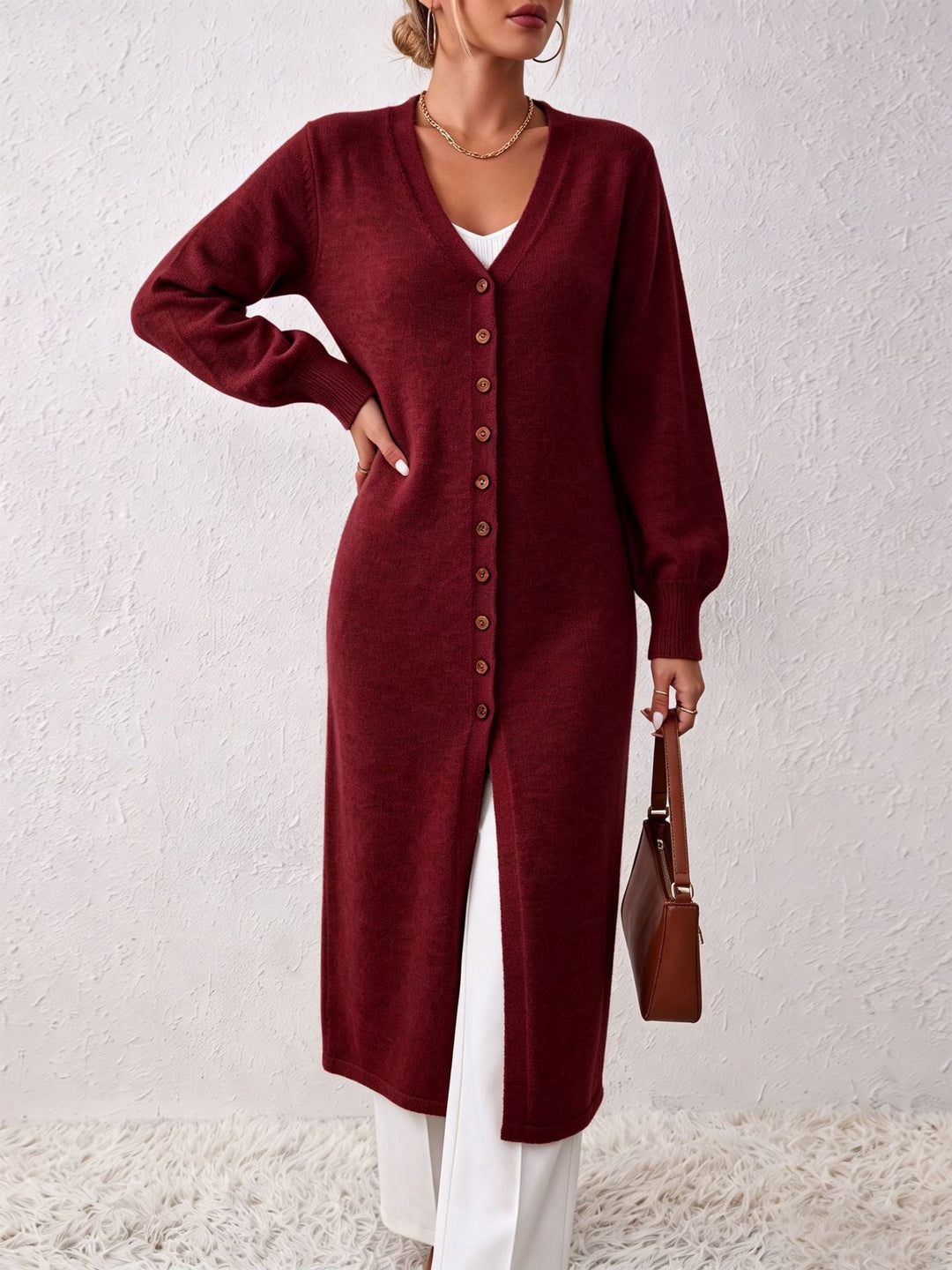 Cardigan donna lungo elegante, perfetto per outfit da giorno o sera, stile raffinato.