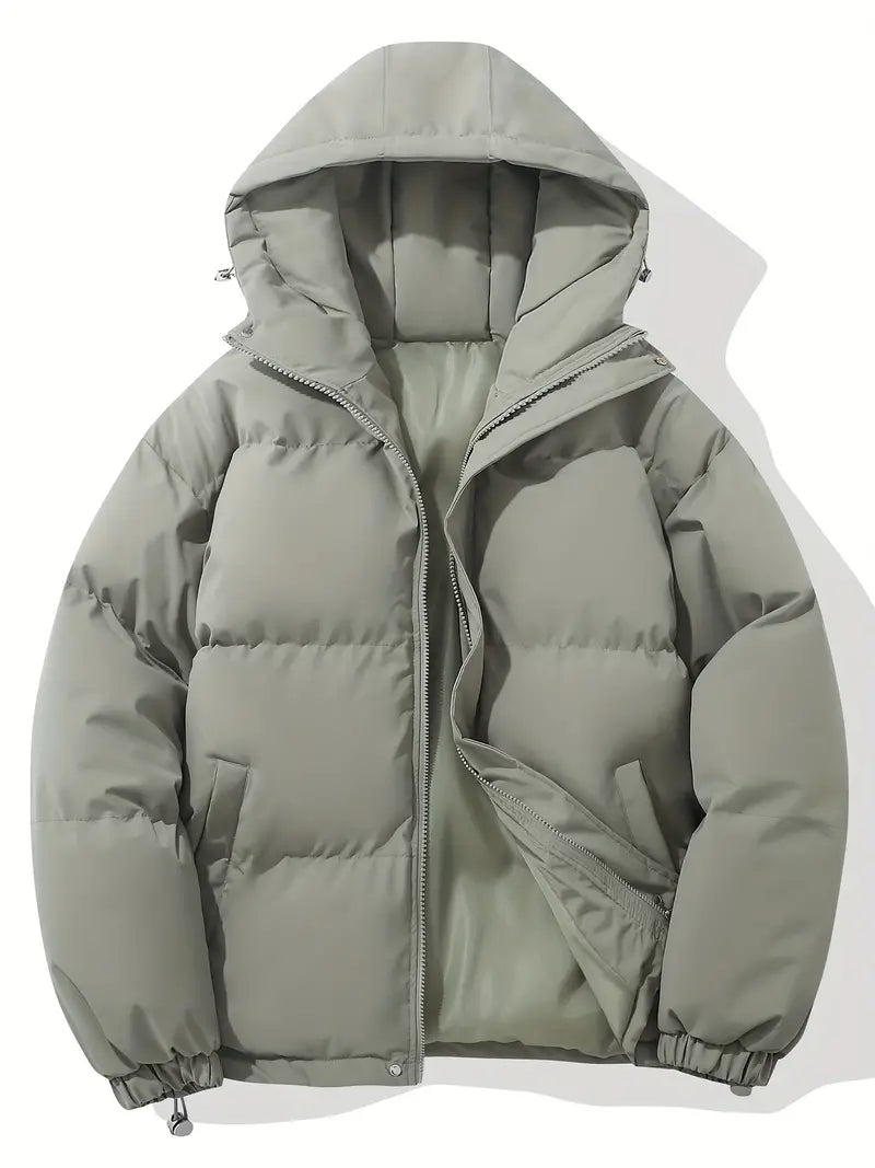 Moderna giacca trapuntata con cappuccio per uomo. Comfort duraturo e stile casual per ogni occasione.