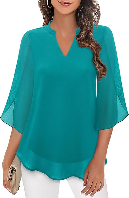 Top donna fluida con maniche a pipistrello, perfetta per un look femminile e versatile. Comfort chic.