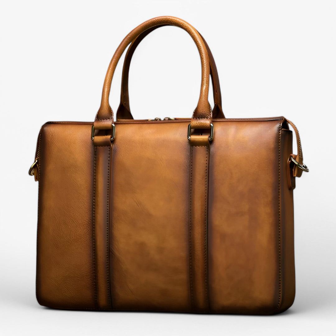 Borsa ufficio donna nera, professionale e spaziosa, con scomparto protettivo per laptop e tracolla regolabile.