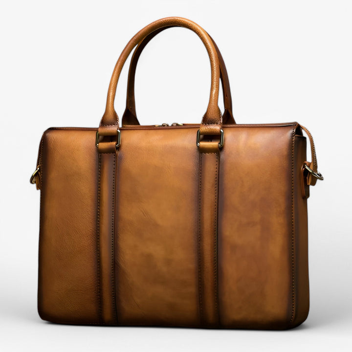 Borsa ufficio donna nera, professionale e spaziosa, con scomparto protettivo per laptop e tracolla regolabile.