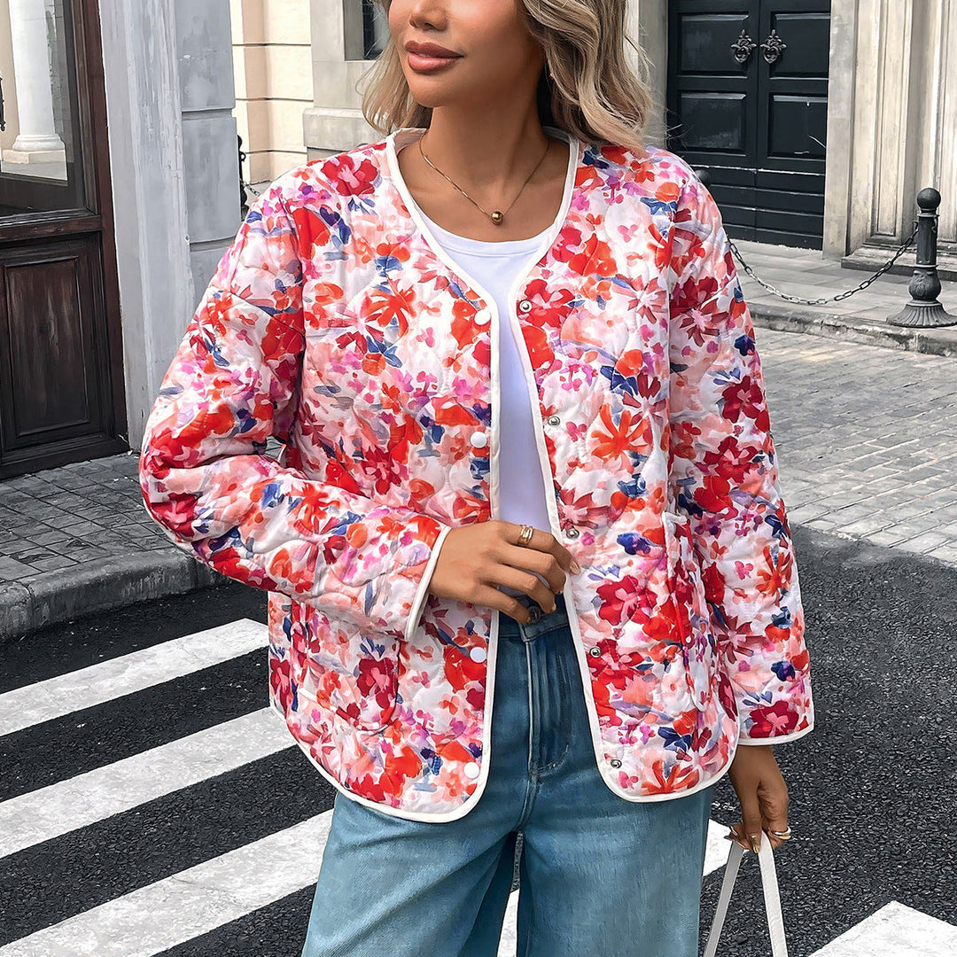 Blusa donna stampata corallo a taglio morbido. Camicetta casual ideale per un look primaverile estivo.