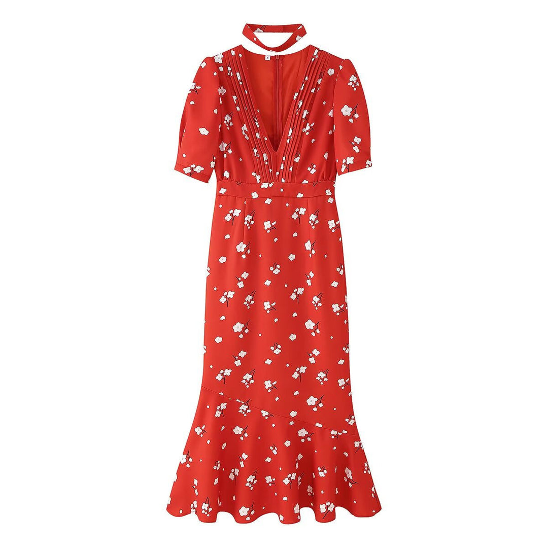 Abito floreale donna midi con maniche a palloncino, gonna a linea A, ideale per un look estivo elegante.