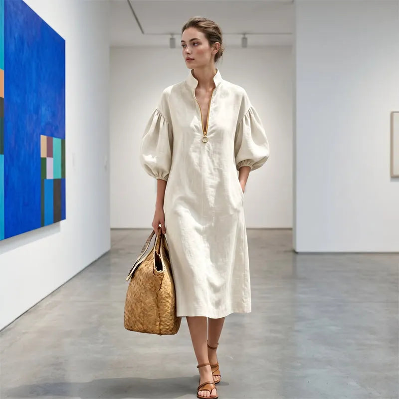 Abito donna A-line midi con maniche a sbuffo e zip discreta, un capo versatile ed elegante.