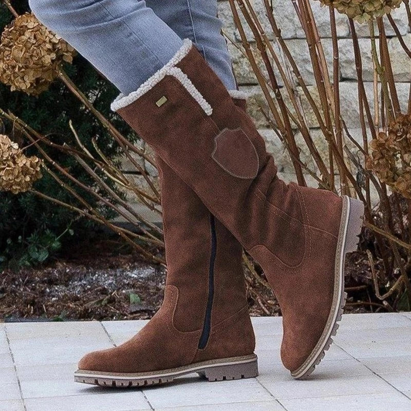 Stivali invernali da donna chic con fodera in peluche per massimo comfort e stile elegante.