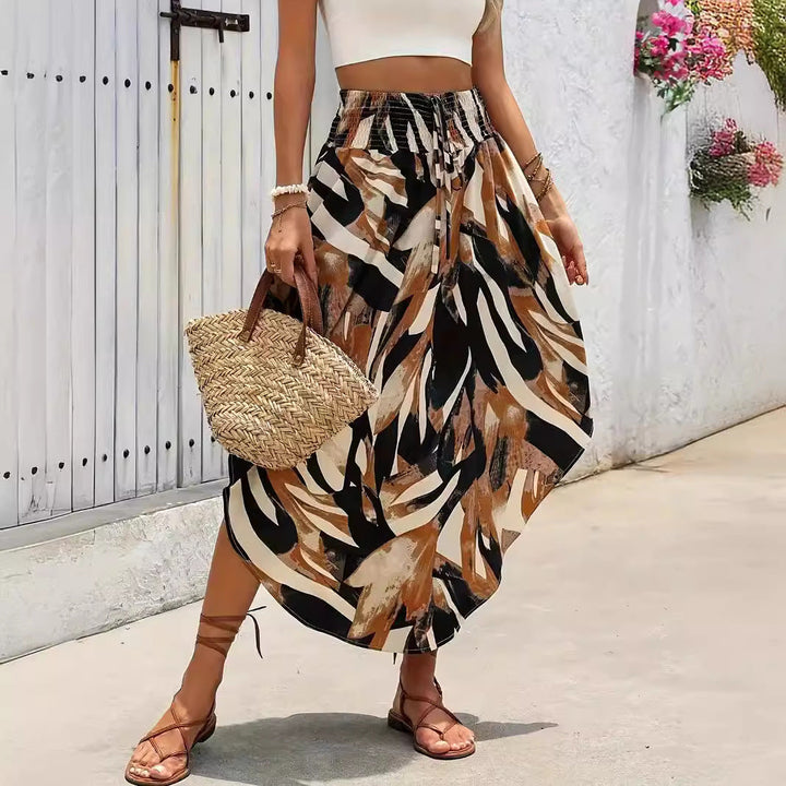 Elegante gonna midi donna a linea A, stampata con dettagli unici e lacci, ideale per stile casual autunno.