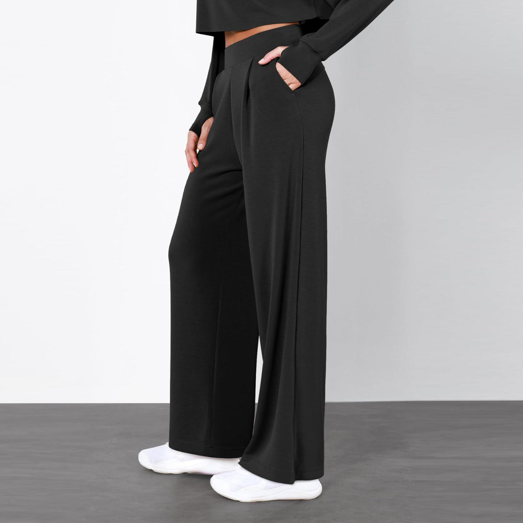 Pantaloni eleganti da donna a vita alta con gamba dritta e drappeggio. Perfetti per outfit raffinati.