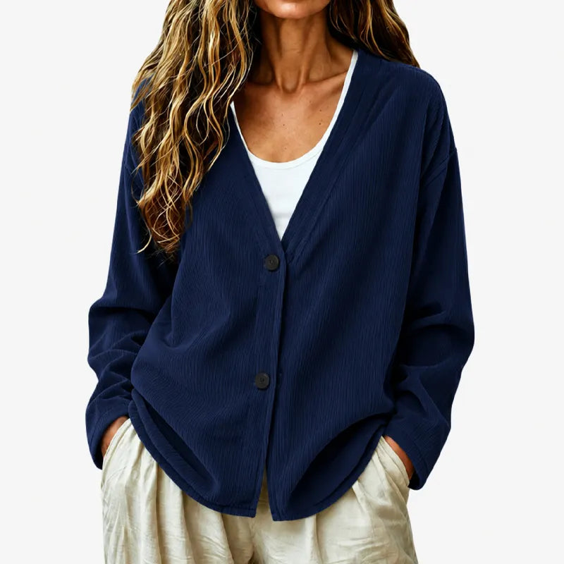 Cardigan donna versatile a coste, scollo a V e bottoni. Adatto a look casual ed eleganti.