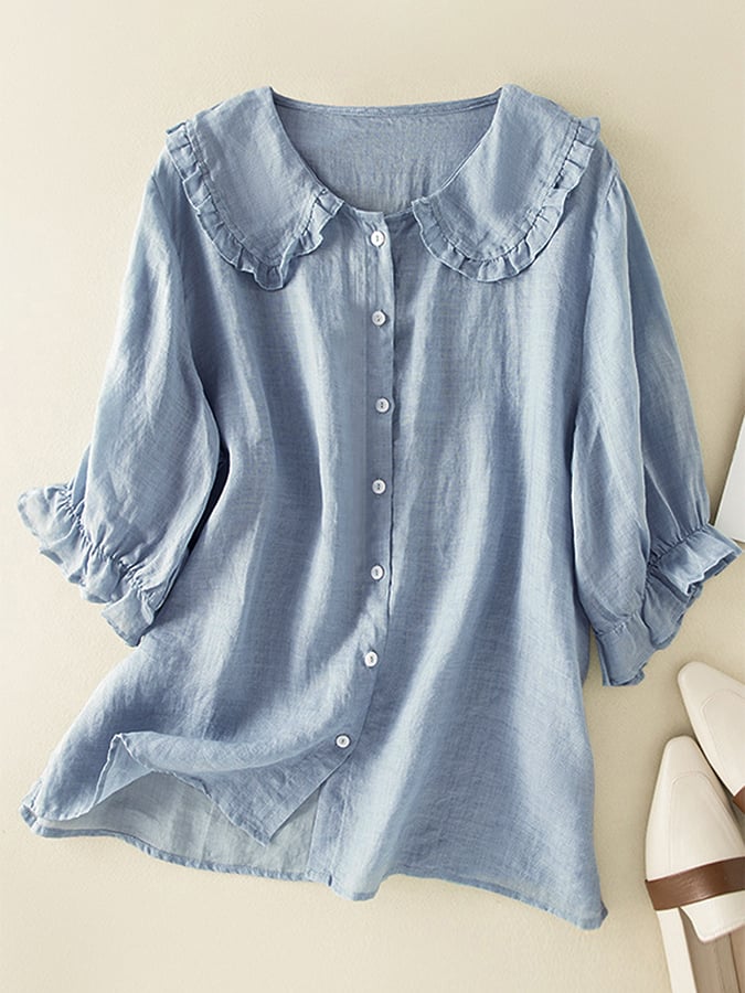 Blusa donna casual ed elegante a vestibilità ampia con distintivo colletto arricciato e maniche lunghe, disponibile in blu.