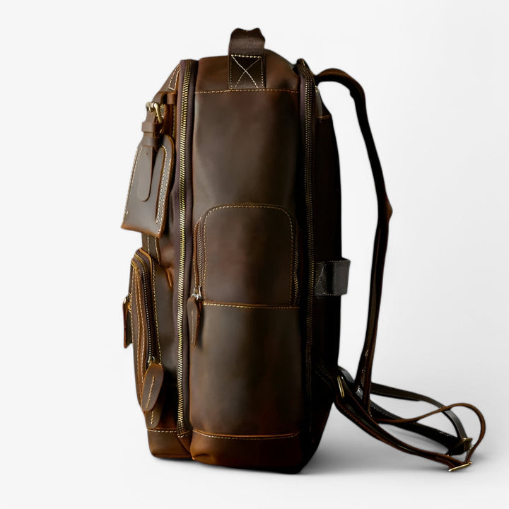 Borsa zaino unisex marrone robusta, ideale per adulti che necessitano di spazio e praticità quotidiana.