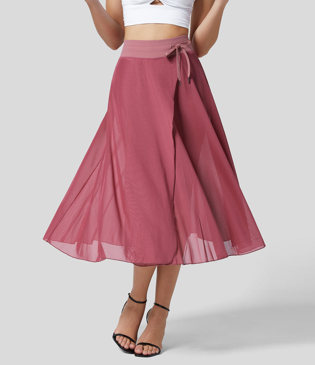 Gonna donna a vita alta, stile midi, con pratica tasca nascosta. Perfetta per ogni outfit.