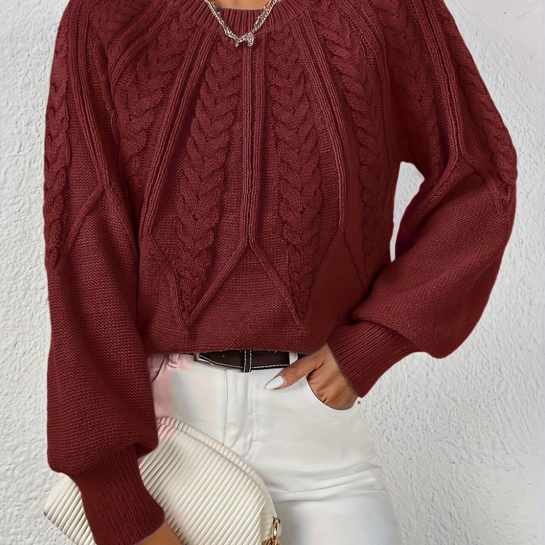 Donna: maglione autunnale a trecce, maniche a palloncino. Calore e stile per il giorno.