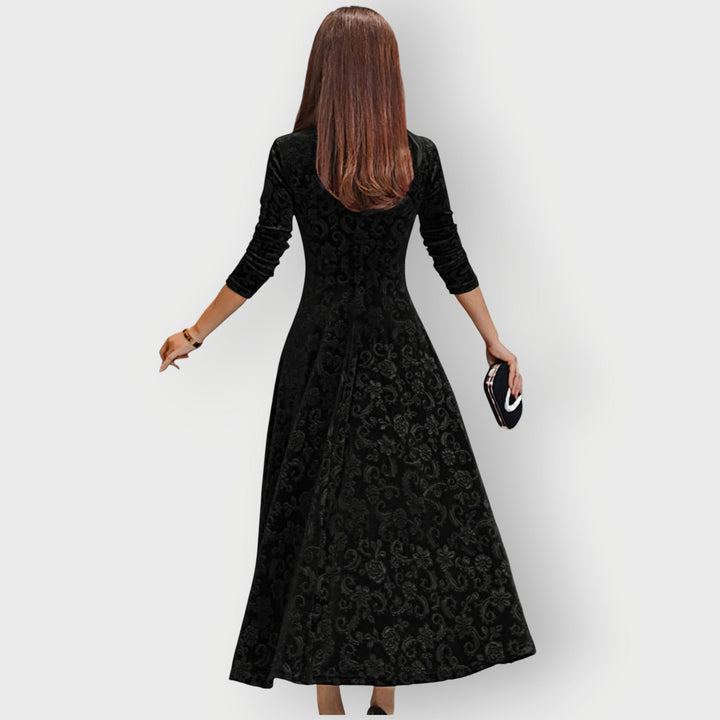 Abito midi donna elegante svasato con scollo a V, ideale per cerimonie, cene di gala e feste chic.