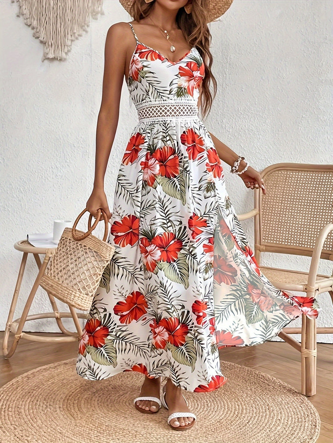 Abito lungo estivo da donna con vivace stampa floreale e spacco laterale elegante.