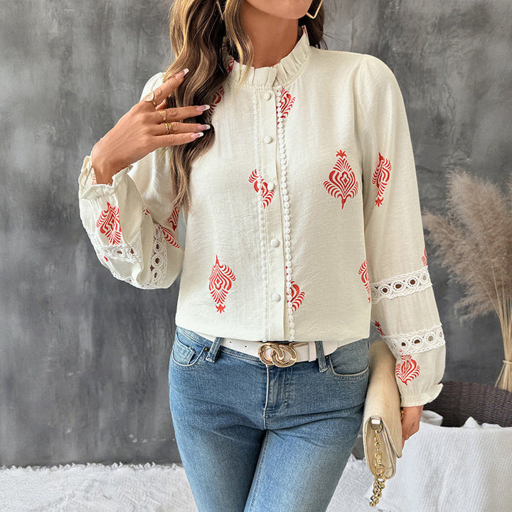 Camicia donna elegante a manica lunga con colletto alto e stampa etnica. Abbigliamento versatile per moda femminile.