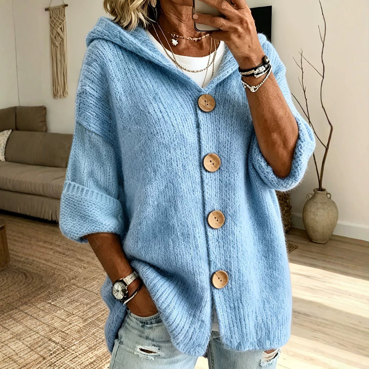 Cardigan donna versatile con cappuccio e bottoni, maniche lunghe, perfetto come giacca leggera casual.