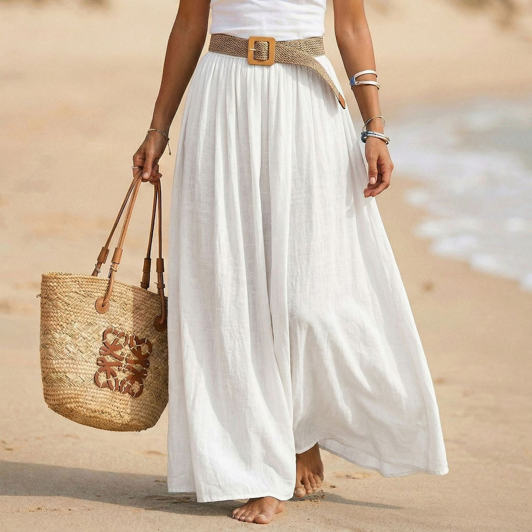 Abito donna estivo, maxi, vita morbida e svasato. Eleganza versatile per ogni occasione.