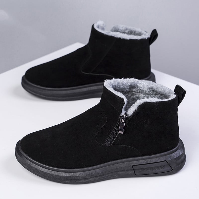 Stivaletti invernali uomo neri con zip laterale, suola piatta. Comfort e stile casual per l'inverno.