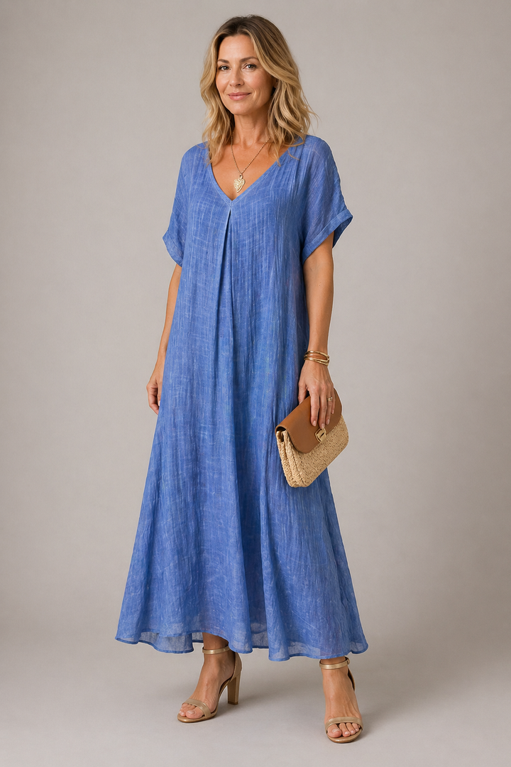 Abito donna casual blu con scollo a V, morbido e versatile per look estivi quotidiani o vacanze.