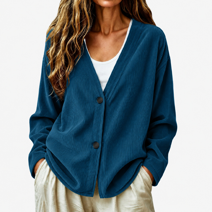 Cardigan donna beige a coste, scollo a V, bottoni. Stile elegante e casual per ogni occasione.