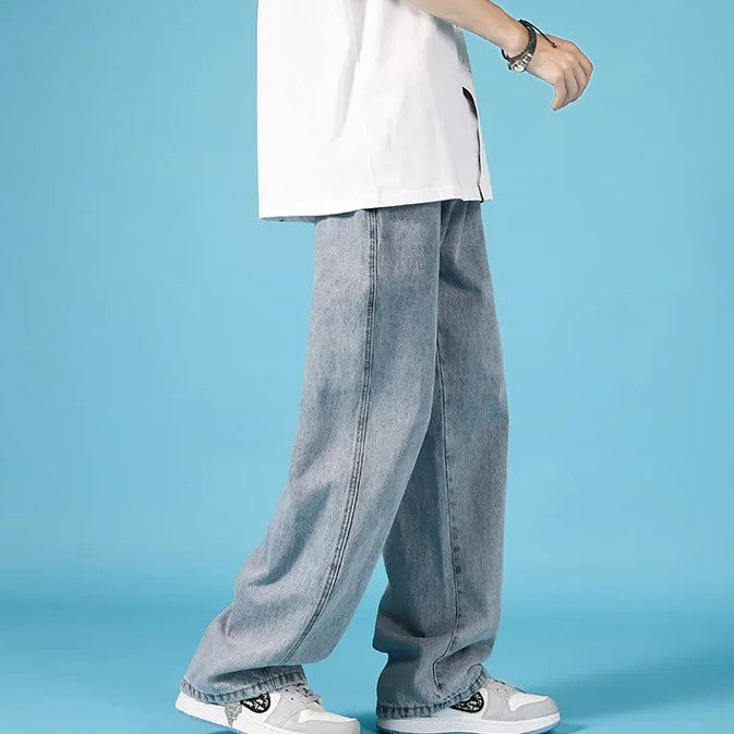 Stile urbano uomo: jeans loose fit a gamba dritta, denim resistente con zip.
