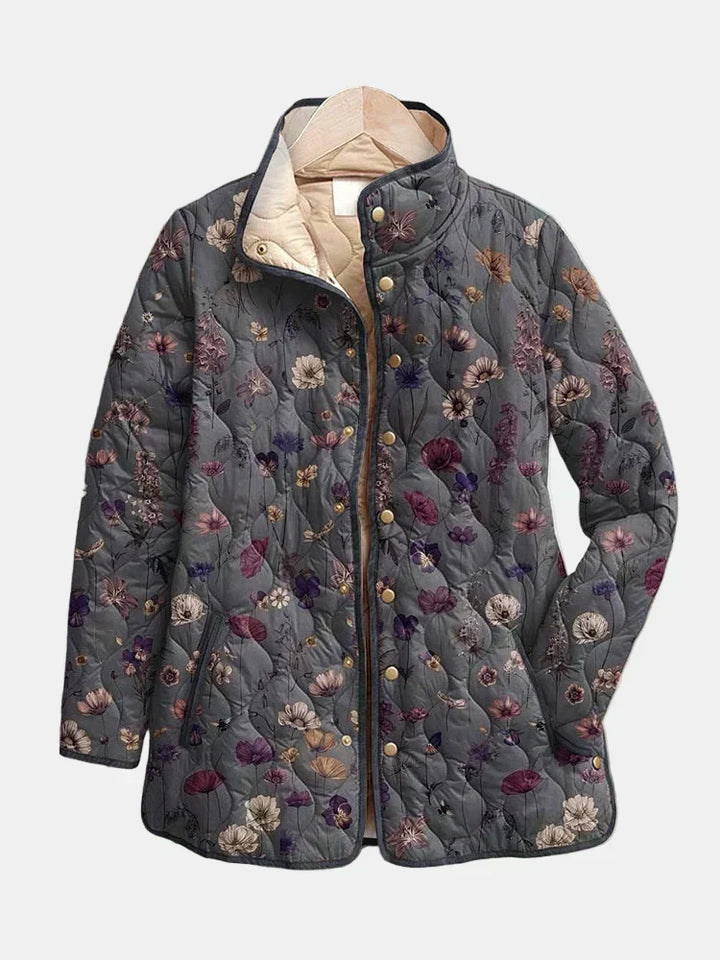 Giacca floreale trapuntata da donna con bottoni, per un look fresco e alla moda.