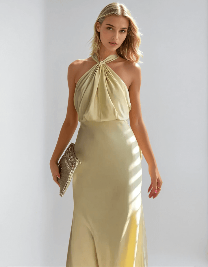 Abito lungo estivo giallo da donna con spalline sottili, perfetto per cerimonie e serate eleganti. Maxi abito moda.
