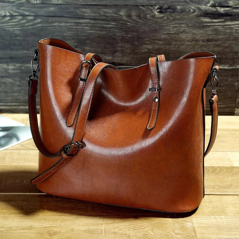 Borsa a tracolla grande donna in similpelle stile vintage, perfetta per un look elegante e casual da giorno.