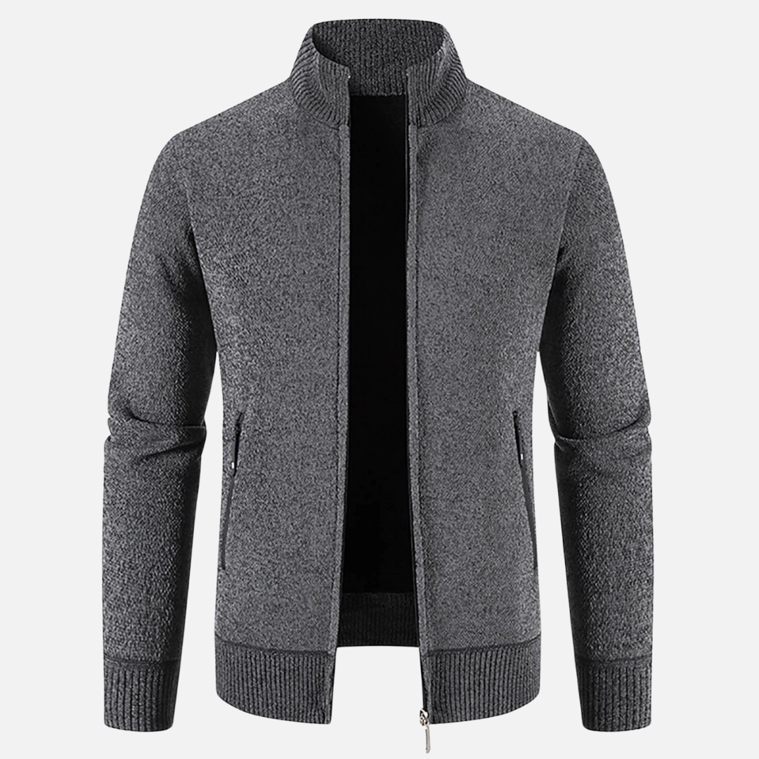 Uomo con giacca invernale grigia, stile casual, cammina in città, perfetta per il clima freddo.
