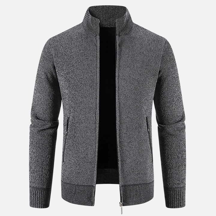 Uomo con giacca invernale grigia, stile casual, cammina in città, perfetta per il clima freddo.