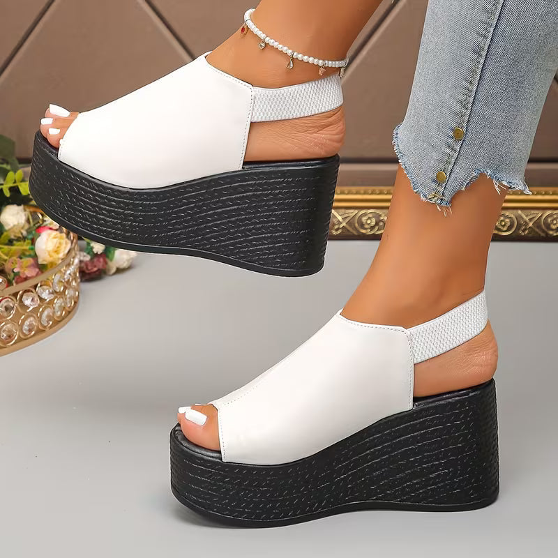 Sandali donna estivi con zeppa slingback, calzature eleganti e comode per un look casual o sofisticato.