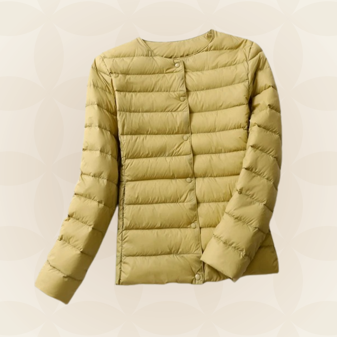Giacca imbottita da donna, essenziale per la mezza stagione, offre calore e leggerezza.