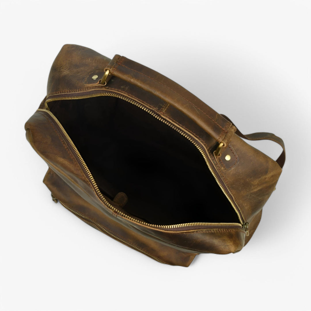 Zaino marrone versatile unisex, perfetto per pendolari e avventure di viaggio, con ampi scomparti.