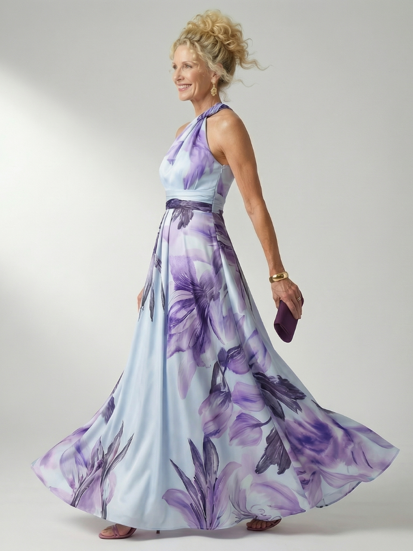 Abito estivo maxi da donna, leggero con vivace motivo floreale, perfetto per un look casual.