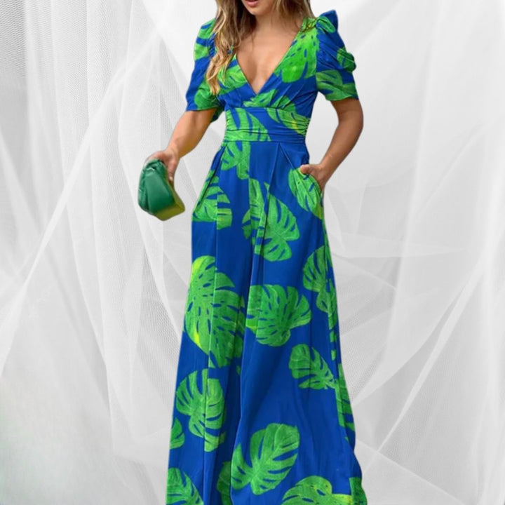 Abito estivo stampato versatile, scollo a V, vestibilità comoda, perfetto per vacanze e moda estiva di tendenza.