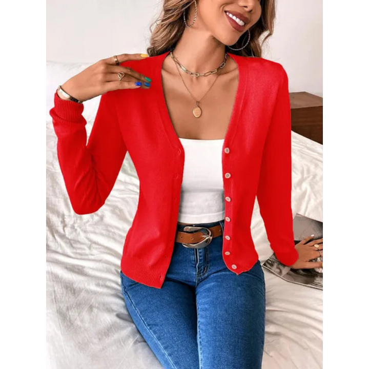 Cardigan donna aderente ed elegante, scollo a V, chiusura con bottoni. Look primaverile/autunnale.