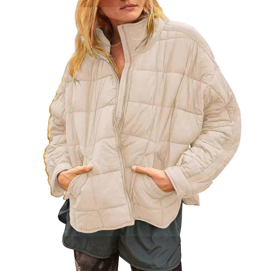 Elegante giacca donna leggera con trapuntatura e cerniera, ideale per look casual autunnali/primaverili.