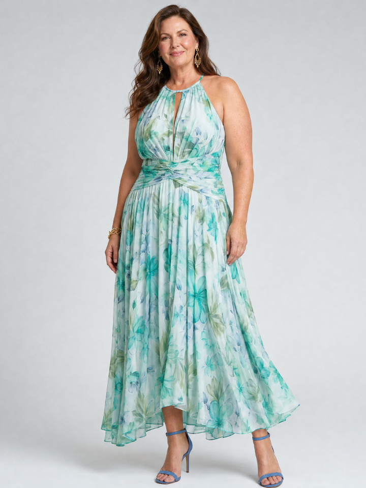 Abito midi floreale verde per donna, plissettato ed elegante, adatto per vacanze estive.