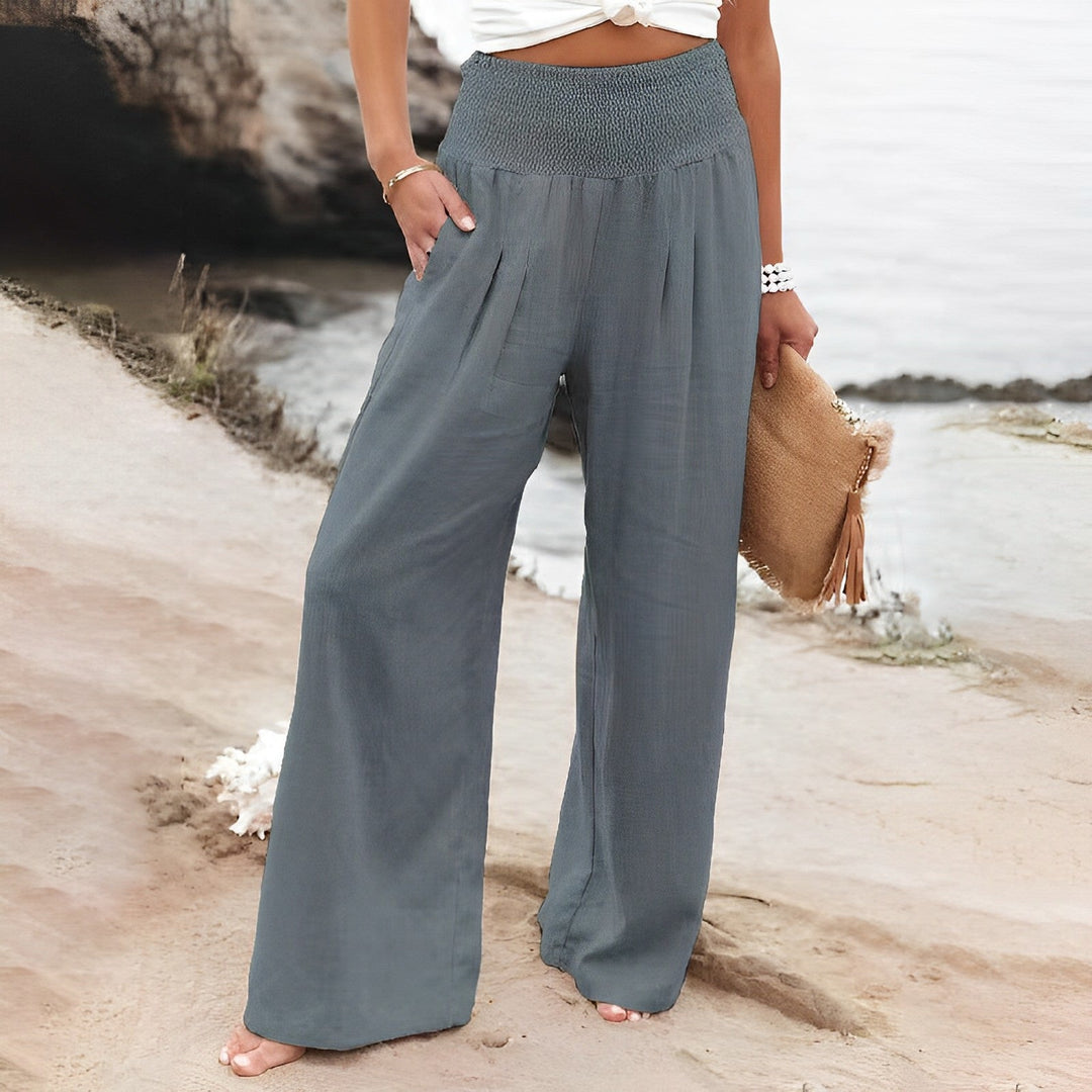 Pantaloni estivi da donna, modello palazzo a vita alta, un capo must-have per la moda primavera estate.