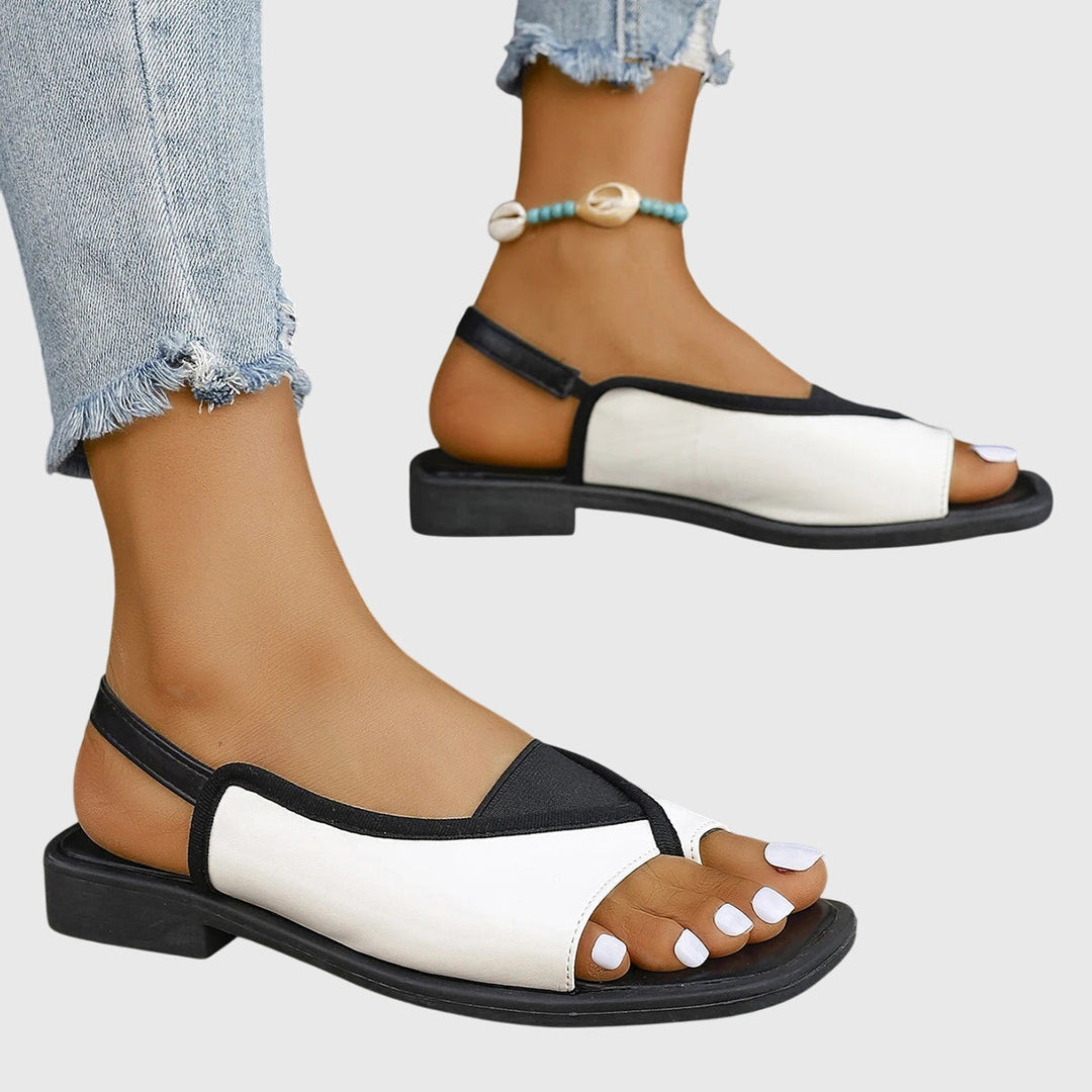 Versatili sandali bassi slingback da donna, ideali per comfort estivo, abbinamenti casual e look vacanzieri.