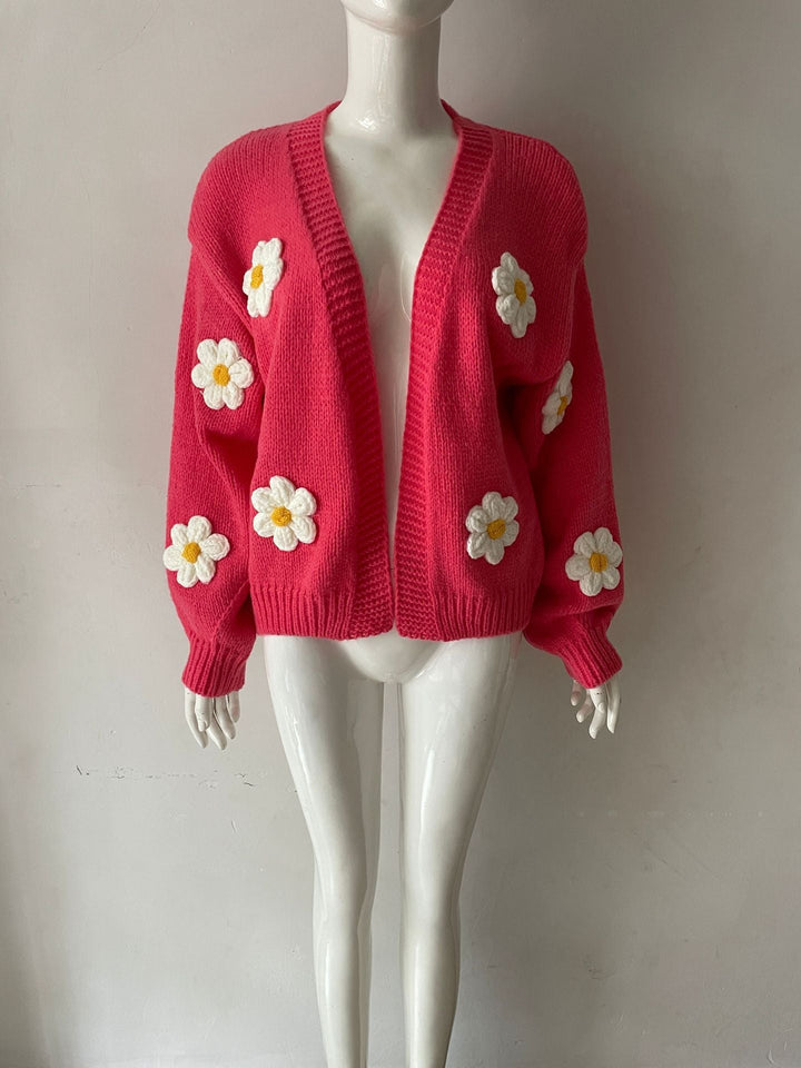 Cardigan donna in maglia morbida, design ampio e colori brillanti. Un must per abbigliamento casual.